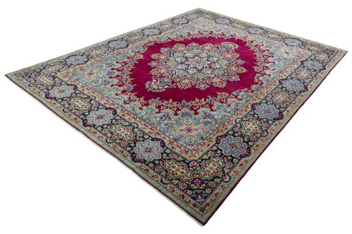 Corner detail of 1970s Kerman rug showing border pattern and Wool pile