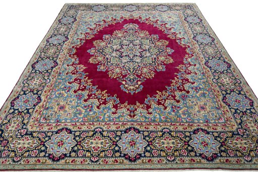 Surface texture of 1970s Kerman rug with natural Wool and intricate pattern