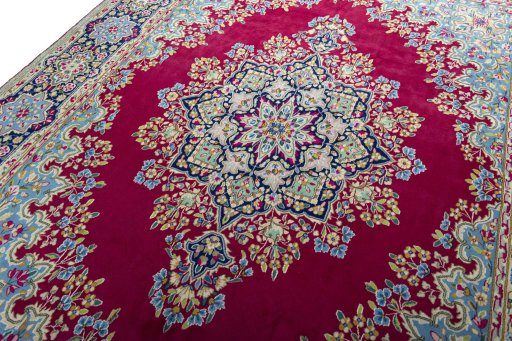 Backside of handmade 1970s Kerman rug showing knot structure and weave density