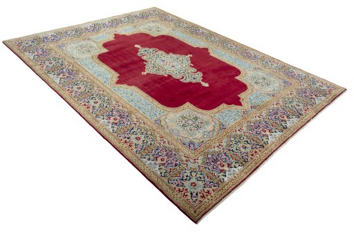Close-up detail of 2000s Kerman rug from Iran / Persia showing Wool weave