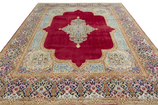 Surface texture of 2000s Kerman rug with natural Wool and intricate pattern
