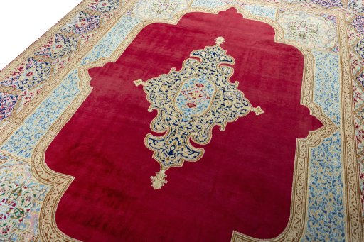 Backside of handmade 2000s Kerman rug showing knot structure and weave density