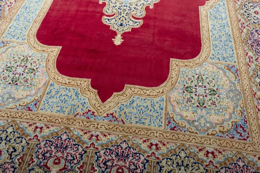 Close-up detail of 2000s Kerman rug from Iran / Persia showing Wool weave