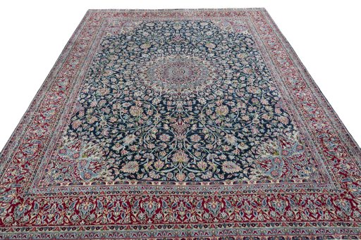 Surface texture of 2000s Kerman rug with natural Wool and intricate pattern