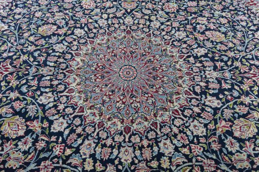 Central medallion detail of 2000s Kerman rug from Iran / Persia