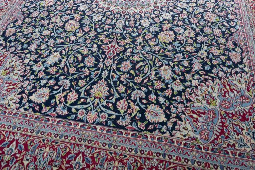 Close-up detail of 2000s Kerman rug from Iran / Persia showing Wool weave