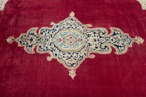Central medallion detail of 2000s Kerman rug from Iran / Persia