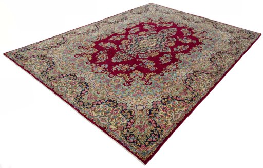 Corner detail of 2000s Kerman rug showing border pattern and Wool pile