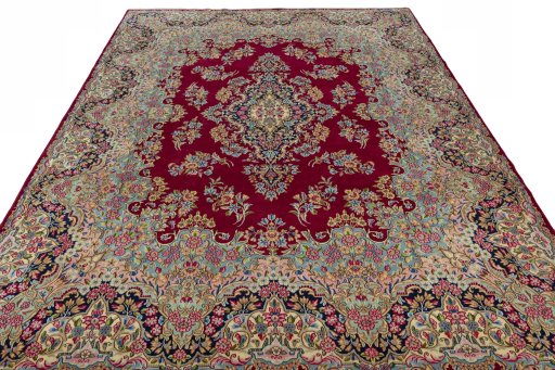 Surface texture of 2000s Kerman rug with natural Wool and intricate pattern