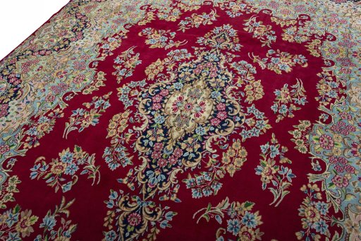 Backside of handmade 2000s Kerman rug showing knot structure and weave density