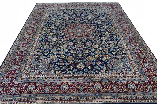 Surface texture of 2000s Kerman rug with natural Wool and intricate pattern