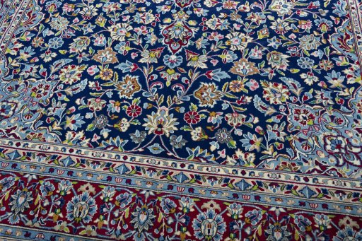 Close-up detail of 2000s Kerman rug from Iran / Persia showing Wool weave