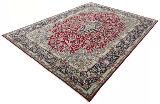 Corner detail of 2000s Kerman rug showing border pattern and Wool pile