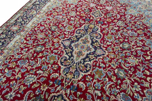 Backside of handmade 2000s Kerman rug showing knot structure and weave density