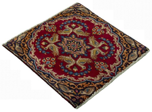 Close-up detail of 2000s Kerman rug from Iran / Persia showing Wool weave