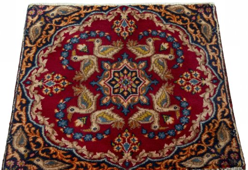 Surface texture of 2000s Kerman rug with natural Wool and intricate pattern