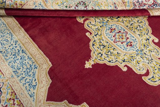 Close-up detail of 2000s Kerman rug from Iran / Persia showing Wool weave