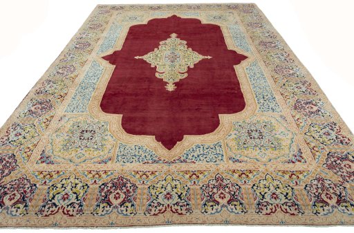 Surface texture of 2000s Kerman rug with natural Wool and intricate pattern