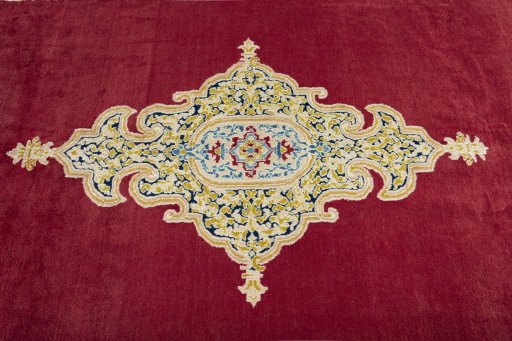 Central medallion detail of 2000s Kerman rug from Iran / Persia