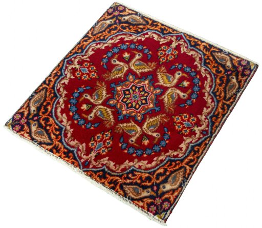 Corner detail of 2000s Kerman rug showing border pattern and Wool pile