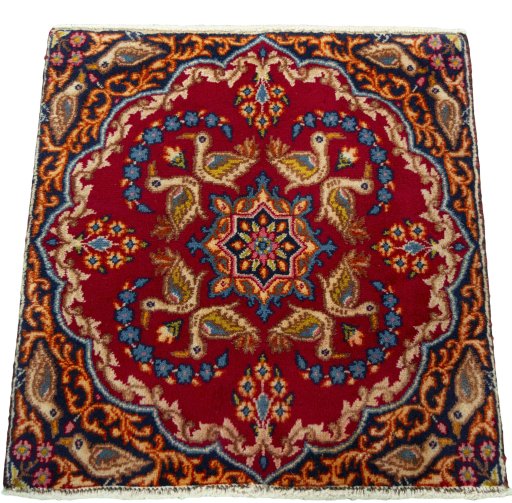 Surface texture of 2000s Kerman rug with natural Wool and intricate pattern