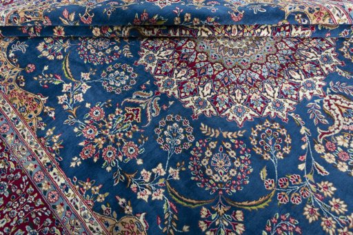 Close-up detail of New Kerman rug from Iran / Persia showing Wool weave