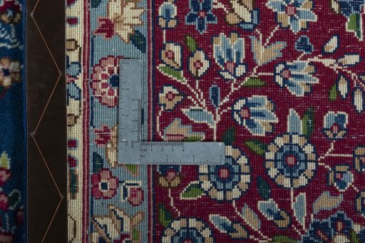 Backside of handmade New Kerman rug showing knot structure and weave density