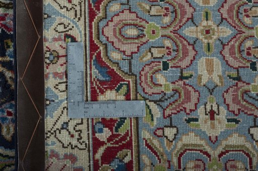 Backside of handmade 2000s Kerman rug showing knot structure and weave density