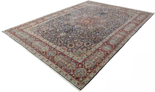 Corner detail of 2000s Kerman rug showing border pattern and Wool pile