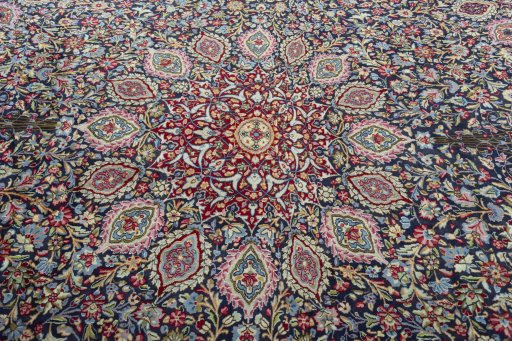 Central medallion detail of 2000s Kerman rug from Iran / Persia