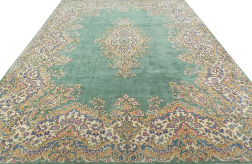 Surface texture of 2000s Kerman rug with natural Wool and intricate pattern