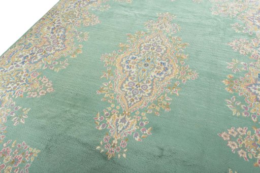 Backside of handmade 2000s Kerman rug showing knot structure and weave density
