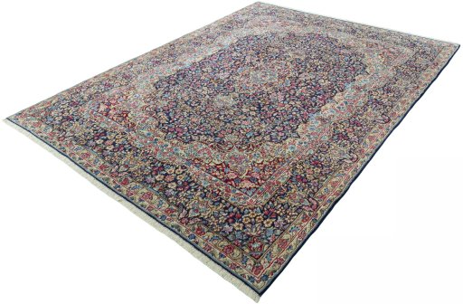 Corner detail of 1970s Kerman rug showing border pattern and Wool pile