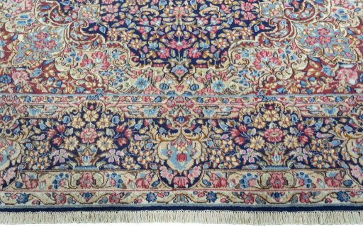 Full view of 1970s Kerman rug from Iran / Persia, 322 × 239 cm in Blue tones