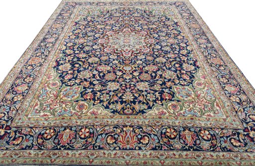 Surface texture of 2000s Kerman rug with natural Wool and intricate pattern