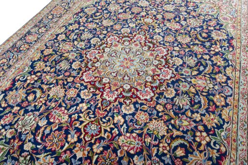 Backside of handmade 2000s Kerman rug showing knot structure and weave density