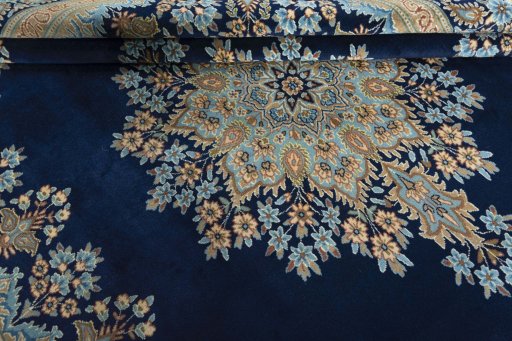 Close-up detail of 2000s Kerman rug from Iran / Persia showing Wool weave