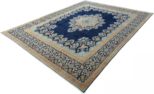 Corner detail of 2000s Kerman rug showing border pattern and Wool pile