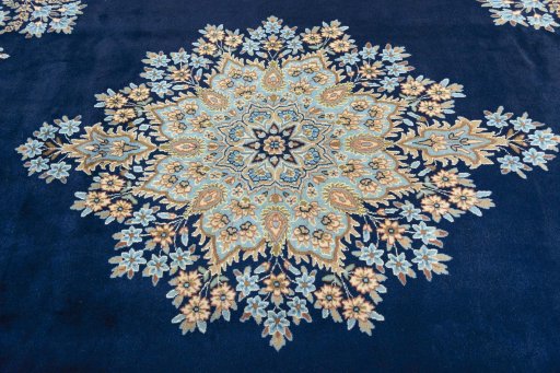 Central medallion detail of 2000s Kerman rug from Iran / Persia