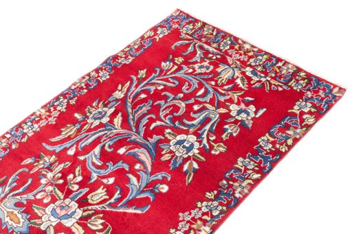 Surface texture of 2002s Kerman rug with natural Wool and intricate pattern