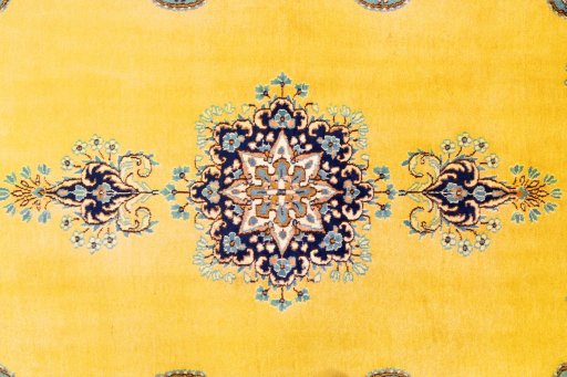 Corner detail of 2000s Kerman rug showing border pattern and Wool pile