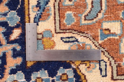 Close-up detail of 2000s Kerman rug from Iran / Persia showing Wool weave