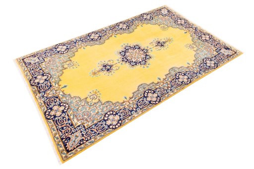 Corner detail of 2000s Kerman rug showing border pattern and Wool pile