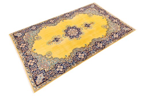Close-up detail of 2000s Kerman rug from Iran / Persia showing Wool weave