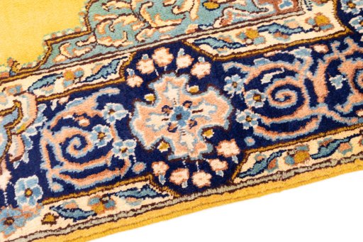 Backside of handmade 2000s Kerman rug showing knot structure and weave density