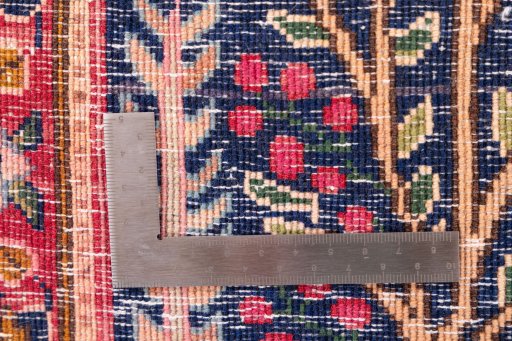 Corner detail of 1970s Kerman rug showing border pattern and Wool pile