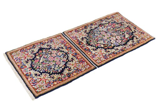 Corner detail of 1990s Kerman rug showing border pattern and Wool pile