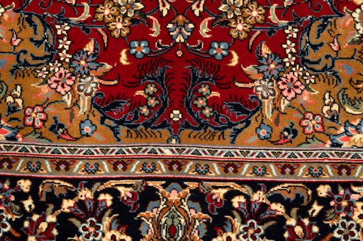 Close-up detail of New Kerman rug from Iran / Persia showing Wool weave