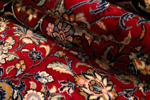 Surface texture of New Kerman rug with natural Wool and intricate pattern