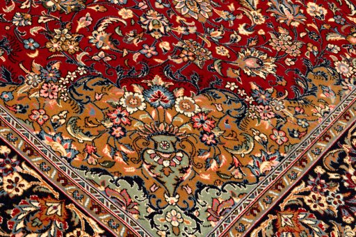 Backside of handmade New Kerman rug showing knot structure and weave density
